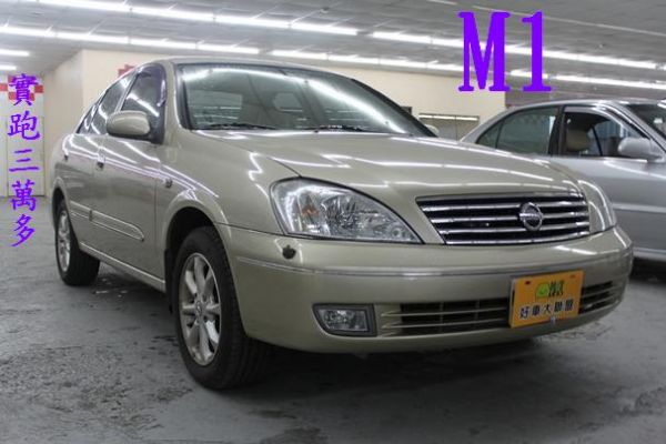 日產 M1 1.8 金色 照片1